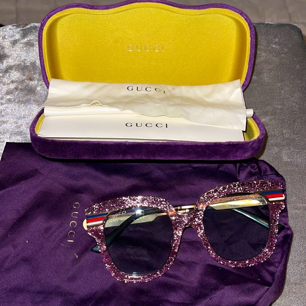 Authentic Gucci sunglasses with clear frame